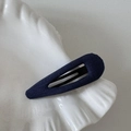Detailed view of dark blue polka dot fabric BB hair clip on a white shell tray - Navy Blue Solid - Water Drop
