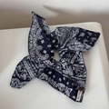 Detailed view of navy paisley scrunchie with lace edge and TRUE FITTED brand label - Navy Blue Paisley Bow Scrunchie