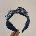 Detail of navy blue paisley pattern scrunchie with delicate lace edges and top bow - Navy Blue Paisley Bow Headband