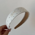 Detail of white satin headband with black polka dots and embroidered bow decoration - Embroidered Bow Polka Dot Hairband - Off-White