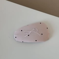Detail of pink fabric hair clip with black polka dots and white bow embroidery - Embroidered Bow Polka Dot Hair Clip - Pink