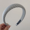 Detail of a handmade black and white checkered headband with a hand made woven label - Padded Headband / Black and White Plaid