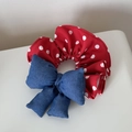 Close-up of red polka dot fabric and denim bow tie on a handmade hair scrunchie - Denim Red Polka Dot - Bow Scrunchie