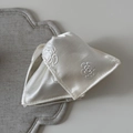 Detail of white satin fabric hair claw with embossed camellia floral pattern - Rose Embossed Triangular Claw Clip (FJ892473) / White