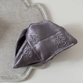 Detail of grey satin hair claw clip featuring embossed rose patterns and silky texture - Rose Embossed Triangular Claw Clip (FJ892473) / Gray Purple
