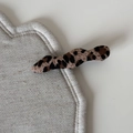 Close-up detail of leopard print fabric texture on a vintage style wavy hair claw clip - Leopard Wavy Straight Clip