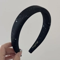 Detail showing high-density satin texture with silver glitter and interior brand label - Starry Headband / Black