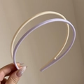 Detail showing non-slip teeth inside purple and beige candy-colored plastic headbands - Beige Purple