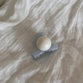 Close-up of a blue matte duckbill hair clip with a large white pearl bead ornament - Blue Claw Clip - Cross with Bead