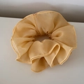 Detail showing the yellow gingham texture and refined ruffled edges of the chiffon scrunchie - Fine Grid Chiffon Waist Cinched Style / Yellow