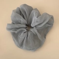 Detail of grey and white gingham organza fabric with pleated texture on oversized scrunchie - Fine Grid Chiffon Scrunchie Style / Blue