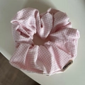 Detailed view of large pink gingham hair scrunchie with brand logo tag on white background - Dopamine Fine Plaid Style (FQ88169) / Pink