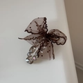 Detail of coffee brown polka dot lace bow hair claw clip with sparkling rhinestones - Duckbill Hair Clips / Brown