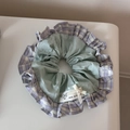 Detail of green and purple plaid scrunchie with a white bow and pearl decoration - Green Purple Plaid Ruffle Scrunchie