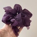 Close-up of deep purple puff chiffon hair scrunchie with soft pleated texture - Purple