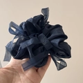 Close-up of fluffy navy blue chiffon scrunchie with elegant layered texture for hair - Navy Blue
