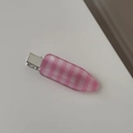 Detail of pink gingham pattern hair clip with silver metal base on white background - Pink and White Checkered Duckbill Clip