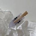 Macro shot of marble texture french acetate hair clip with gold metal duckbill clip design - Transparent Row Rhinestone