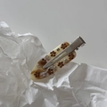 Detail of marble pattern acetate hair clip with floral accents and sparkling rhinestones - Apricot Coffee Flower