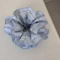 Close-up of light blue fabric scrunchie featuring delicate white lace floral embroidery - Small Flower Lace Waist Scrunchie - Blue