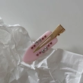 Macro detail of French marble pink acetate hair clip with rhinestones and gold metal base - Pink Row Rhinestone