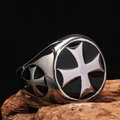 Macro shot of punk style stainless steel cross ring with black enamel on rock - Size 7 / Steel