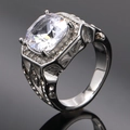 Macro detail of silver titanium steel ring with four-claw set cubic zirconia and pavé accents - Size 7 / Steel Color White Gemstone