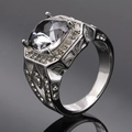 Detailed macro view showing the oval-cut gemstone and intricate hollow geometric engraving - Size 7 / Steel Color Mineral Black Gemstone