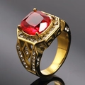 Macro detail of cushion-cut red gemstone ring with pavé stones and vintage hollow design - Size 7 / Gold Red Stone