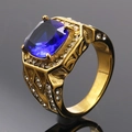 Detail of gold titanium ring with a large blue cushion-cut stone and micro-pave diamonds - Size 7 / Gold Blue Stone