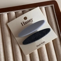 Detail shot of vintage denim blue and grey hair clips set on a beige jewelry display - Dark Blue Light Blue Long Oval Clip