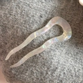 Detailed close-up of wavy acetate U-shaped hair pin with France Hand Made engraving - Wavy U-Shaped Pin (Transparent White) / Clear White