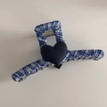 Detailed view of blue and white plaid lace hair claw clip with black 3D heart decor - Blue Plaid Straight Hair Pin