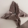 Close-up of satin floral scrunchie with side woven label and dainty bow pattern - Coffee Print Ribbon Scrunchie