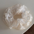 Detailed close-up of vintage beige embroidery lace scrunchie with intricate floral patterns - Off White