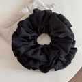 Detail of layered black pleated mesh scrunchie with soft chiffon texture and volume - Frill Oversized Scrunchie Satin Style