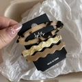 Vue détaillée d'un ensemble de 3 barrettes en acétate avec motifs marbre et léopard chic - Ensemble Écaille Claire