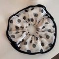 Detail of white chiffon scrunchie with black polka dots and Change logo webbing edge - Chiffon Polka Dot Scrunchie-Black