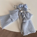 Detail of light blue pleated fabric scrunchie with grey bow and large white pearl accent - Blue Pleated - Ribbon Scrunchie