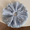 Detail of light blue fabric scrunchie with grey satin bows and pearl embellishments - Blue Pleated - Large Scrunchie