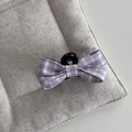 Dettaglio del fermaglio per capelli a fiocco scozzese viola con trama in tessuto morbido - Piccola Molla con Fiocco Gingham / Viola