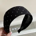 Detailed view of black and white polka dot wide headband with non-slip inner teeth - Black Wide - Coarse Polka Dot