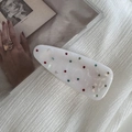 Detailed close-up of translucent hair clip with colorful rhinestones on vintage magazine - Waterdrop Shape (FJ891659) / Creamy White - Waterdrop Clip
