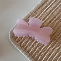 Detail of pink glitter butterfly hair claw clip with pearlescent resin finish and metal spring - Pink Glitter Jelly - Petal Knot