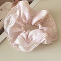 Close-up of pink organza scrunchie featuring elegant white flower and bow embroidery - Pink (Standard Scrunchie)