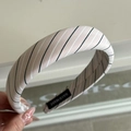 Chic padded headband in light pink fabric with thin dark stripes for hair styling - Fresh Striped Pink Headband