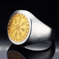Close-up of Viking compass Vegvisir and runes engraved on a brushed steel ring - US 7 / Gold & Silver