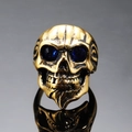 Men's punk skull ring in gold stainless steel with blue stone eyes and vintage finish - US 6 / Gold