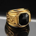 Detail of men's gold-plated ring featuring an octagonal black gemstone and side relief - US 7 / Gold Black