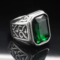 Macro view of emerald-cut green stone ring with Celtic patterns and silver vintage finish - Size 7 / Vintage Silver Dark Green Gemstone
